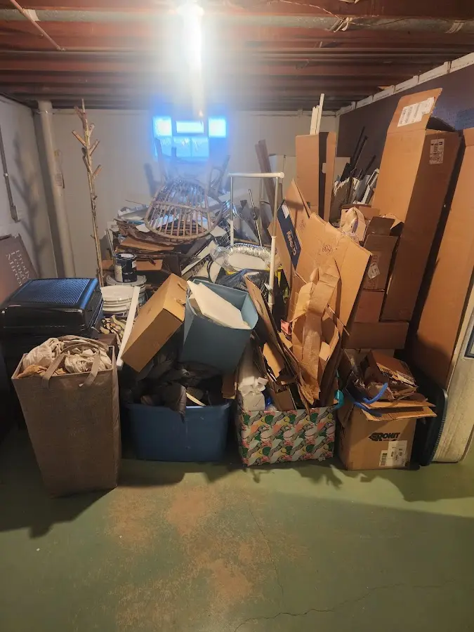 Roll-off dumpster container at job site for Construction Dumpster Rental in Pass Christian